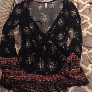 Cute floral shorts romper.